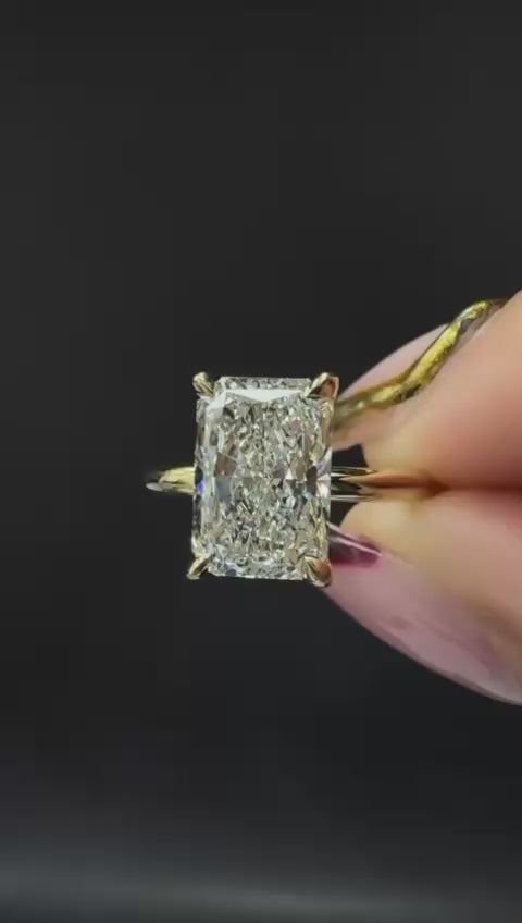 2ct E vs1  Elongated Radiant with Yellow gold band